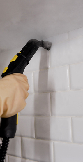 stock-photo-hot-steam-cleaning-removes-dirt-from-grout-lines-in-the-kitchen-cleaning-the-seams-of-ceramic-wall-2485884995-2